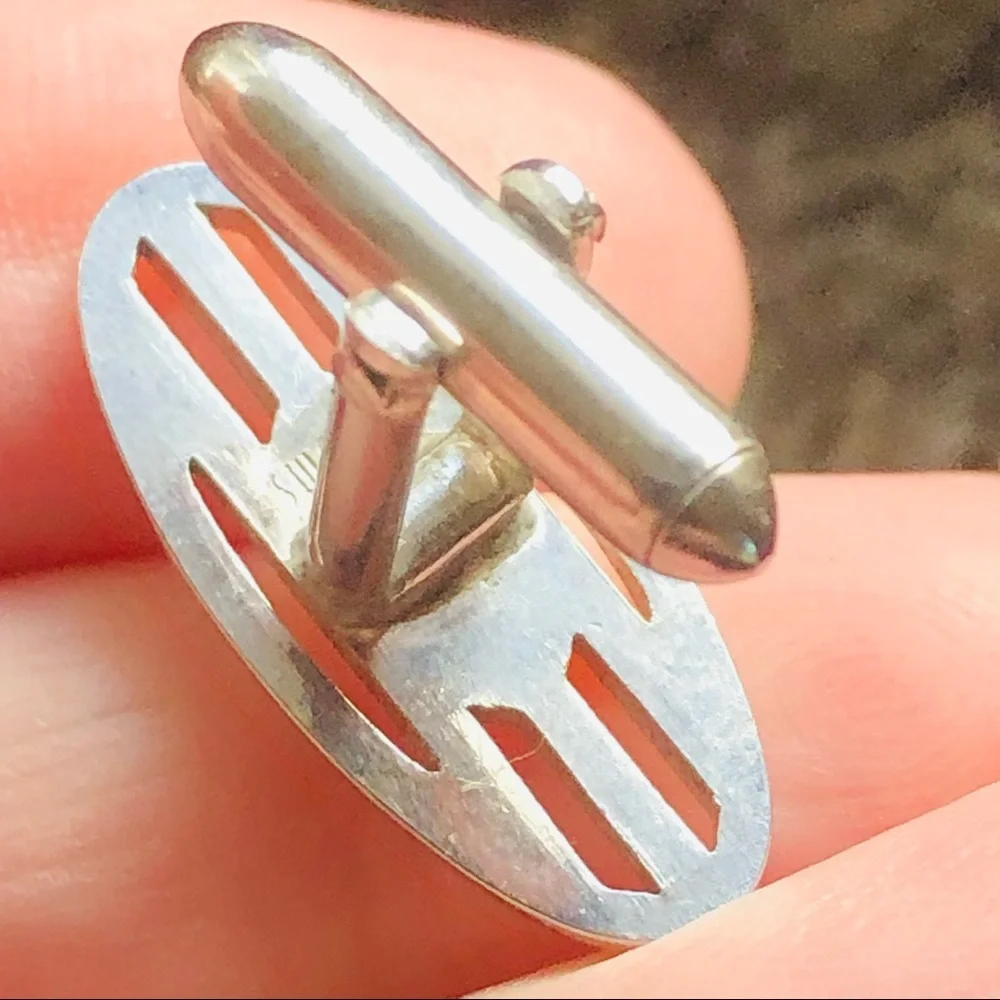Vintage men’s Swank silver thin oval rope design cuff links
